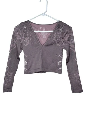 Top cropped ioga Free People movimento FP com nervuras L/S ajustado M/L médio grande Pilates - Imagem 1 de 4
