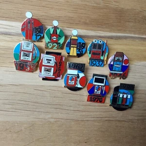 Pin’s Elf Pompes A Essence 10 Pins Set - Picture 1 of 6
