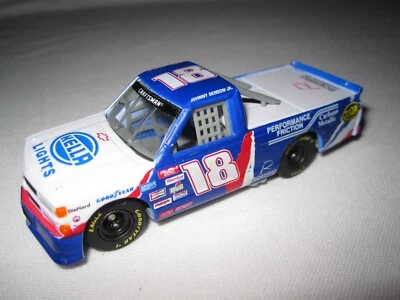 Johnny Benson Jr. #18 Hella Lights Chevrolet NASCAR Craftsman Truck 1:64 - Image 1 of 4