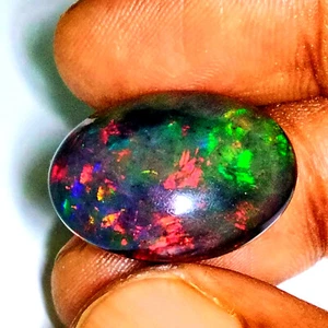 14.08CTS Multi color play black natural ethiopian opal oval cabochon - Picture 1 of 2