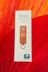 Olight i1R 2 EOS Limited Edition Anodized Orange Yummy Color - Bild 1 von 6