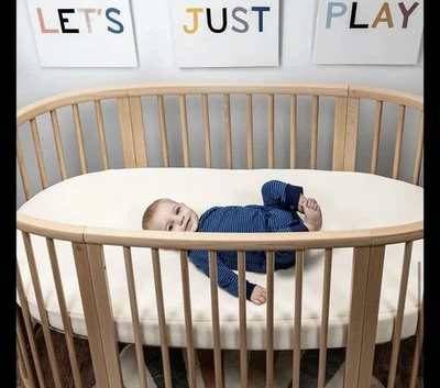 Colgate Stokke Sleep | Organic Oval Thick Foam Crib Mattress 28" x 48" x 4" NEW - Image 1 of 4
