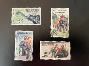 DAS KÖNIGREICH LAOS 1959 LOT VON VIER BRIEFMARKEN MIT ELEFANTEN - Bild 1 von 1