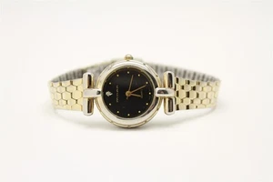 Reloj analógico para dama Milan MLN724 esfera negra tono dorado NECESITA batería - Imagen 1 de 5