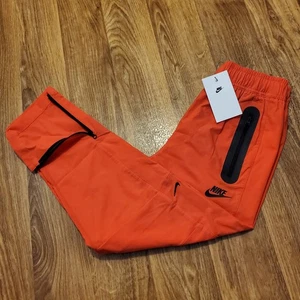 Nike Tech Woven Pants Joggers Boys XL Red Black Kids HQ8921-696 New - Picture 1 of 8