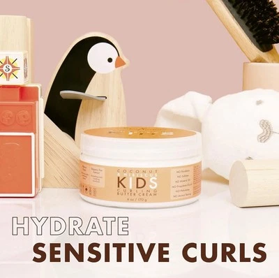 Crema para rizar SheaMoisture para rizos definición coco e hibisco rizo Foto 1 de 4