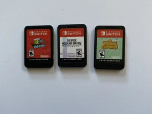 Nintendo Switch Game Lot of 3 Games Mario Odyssey Smash Bros Animal Crossing - Picture 1 of 2