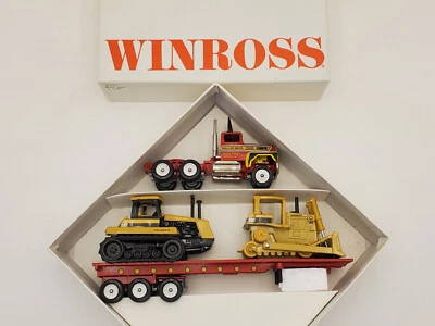 Тракторный прицеп Winross 1993 Keller Bros. Ford с нагрузкой Caterpillar - ограниченный выпуск - Изображение 1 из 4