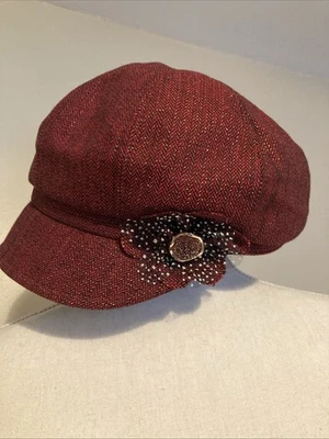 Boné jornaleiro feminino ajustável com roseta - Imagem 1 de 4