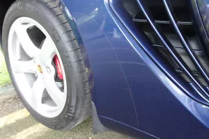Juego de guardabarros CLARO para Porsche Boxster Cayman genuino OEM protectores de piedra calidad - Imagen 1 de 1