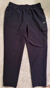 Pantalones deportivos Reebok ligeros con bolsillos para piernas cónicas con un bolsillo de carga talla XL - Imagen 1 de 4