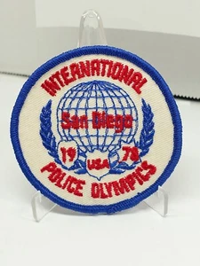 International Police Olympics 1978 Patch san diego faded white blue red vintage - Picture 1 of 2