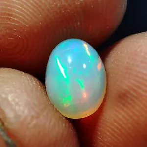 1,50 cts opale etiope ovale cabochon welo multi fuoco opale pietra sciolta 9x7 mm - Foto 1 di 5
