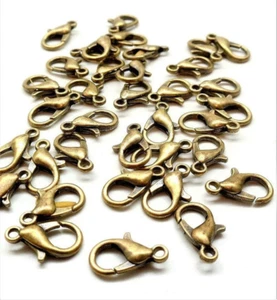 10 fermoirs mousquetons en laiton bronze 21x12 mm - Imagen 1 de 2