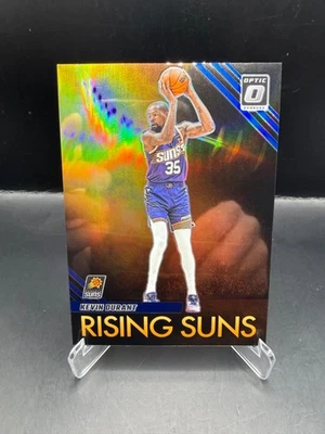 2023-24 Panini Donruss Optic Kevin Durant Rising Suns Azul/49 #10 Phoenix Suns Foto 1 de 2