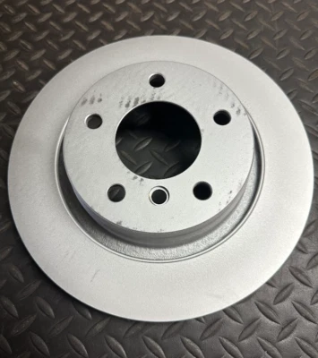 Rotor de freno trasero BMW - 34-21-6-864-056 - para BMW Z4, 325Ci, 325i, 328Ci y más Foto 1 de 4