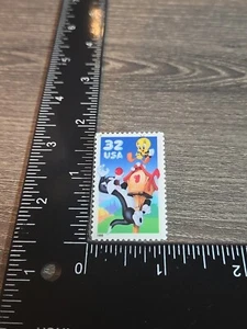 Prendedor de sello Scott 32c Piolín y Silvestre 1998 Usps plástico J8 - Imagen 1 de 3