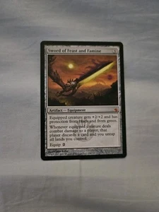 Sword of Feast and Famine Mirrodin Besieged Regular - Picture 1 of 8