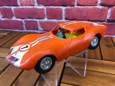Coche de carreras COMO ESTÁ IMPERFECTO RARO de colección MARX TOYS NARANJA #7 SIN CONTROL REMOTO INCOMPLETO Foto 1 de 4