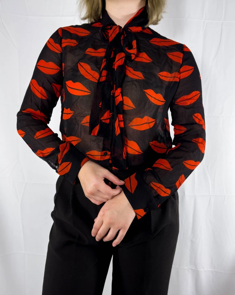 Blusa Saint Laurent con estampado de labios negra transparente con lazo delantero - talla FR 42 Foto 1 de 4