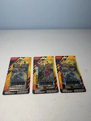 Paquete de 3 ampollas Pokémon con tempestad plateada y golpe de fusión con lote de prendedores Jirachi Foto 1 de 3