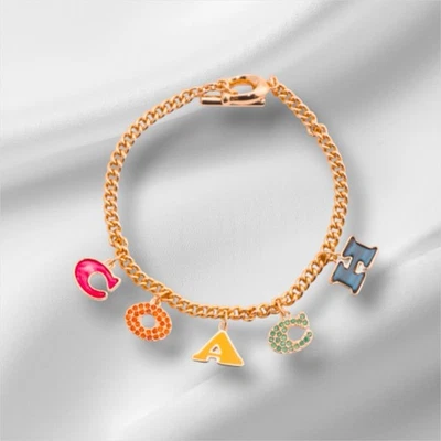 NUEVO CON ETIQUETAS Pulsera Coach Charm 7.5 pulgadas de largo Esmalte Circonita Cúbica Tono Dorado Joyería Foto 1 de 3