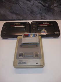 Super Nintendo Spielekonsole  mit Super Mario Bros + 2x Sega Mega Drive 2 Konsol