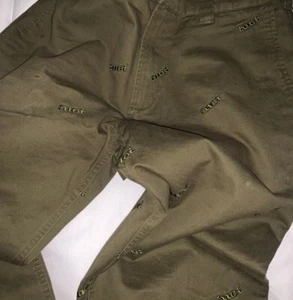 Pantalones Chinos Fuct Scattered Bordados, Oliva, NUEVOS en Bolsa, Calce Relajado, Algodón - Imagen 1 de 14