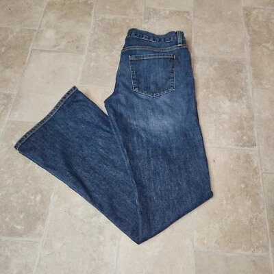 Pantalones de mezclilla de papel y tela bootcut bajos para mujer 32 Foto 1 de 4