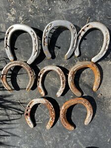 25 used rustic horse shoes