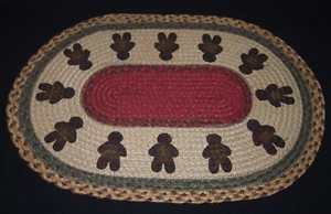 Mantel individual de yute trenzado ovalado de pan de jengibre para hombre de Navidad o remache grande-19" x 13" - Imagen 1 de 3