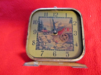 "Reloj despertador Lux rueda de agua giratoria", vintage, se vende para piezas Foto 1 de 4