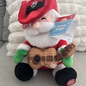 Animierter Cowboy Kris Kringle Plüsch von Cuddle Barn 11 Zoll Höhe x 10,25 Zoll Breite x 7 Zoll Tiefe Alter 2+ - Bild 1 von 3