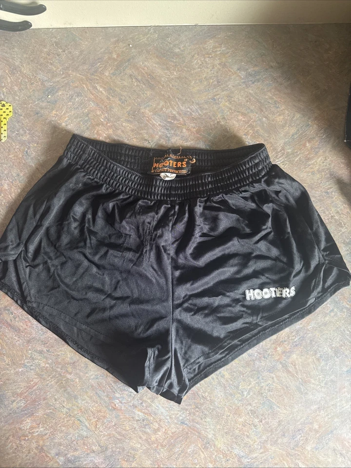 Pantalones cortos Hooters XS vintage negros Foto 1 de 1