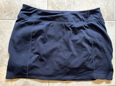 Falda corta mandarina para mujer pequeña azul marino falda golf tenis atlética bolsillo con cremallera Foto 1 de 4