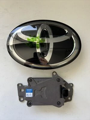 TOYOTA TACOMA CRUISE CONTROL DISTANCE RADAR SENSOR FRONT GRILL EMBLEM OEM Logo - Image 1 of 4
