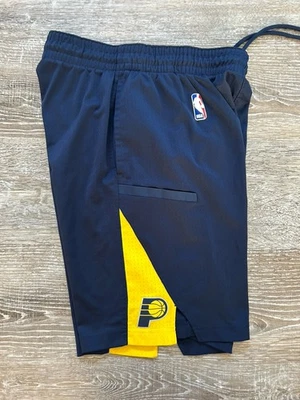 Pantalones Cortos de Baloncesto Indiana Pacers Swingman NIKE Dri Fit Bolsillos Pequeña Práctica Foto 1 de 4