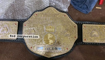 Réplica de cinturón de campeonato de lucha de peso pesado Crumrine STING Big Gold 4 mm Foto 1 de 3