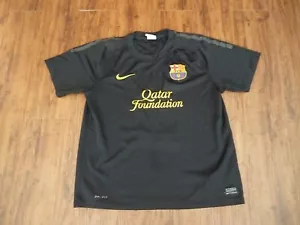 Camiseta visitante F C Barcelona 2011-12 Nike niños 14-16 grande negra en muy buena condición ¡RARA! - Imagen 1 de 10