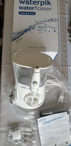 Waterpik Aquarius WP-660C Flosser Elettrico con Filo Bianco 10 Impostazioni - Foto 1 di 8
