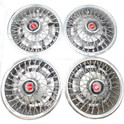 Juego de 4 tapacubos de alambre Ford Fairmont Mustang Granada 1977-80 OEM 13" cubiertas de rueda Foto 1 de 4