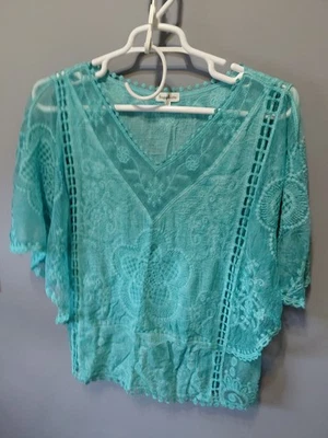 Top de mujer zafiro M turquesa caprichoso encaje raglán manga aleteada Foto 1 de 4