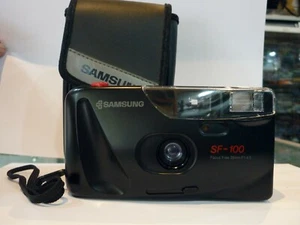 SAMSUNG SF-100 FOCUS FREE 35MM F1:4.5 FILM CAMERA / FOR PARTS OR NOT WORKING - Picture 1 of 12