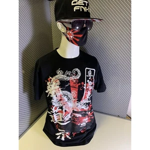 CAMISETA GET FNKD JDM LEGENDS R34 SKYLINE GT-R - NEGRA - MODA NISSAN GODZILLA - Imagen 1 de 4