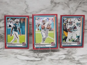 2025 Donruss Red Press Proof De'Von Achane Tua Tagovailoa Jalen Ramsey Dolphins - Picture 1 of 2