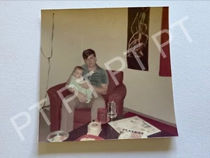 1970s Vintage Snapshot Found Photo Young Man Holding A Baby - Picture 1 of 2
