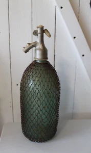 Antique Seltzer Green Bottle w/ metal mesh. STAS3249-65 TNS, on bottom, 1 litter - Picture 1 of 3