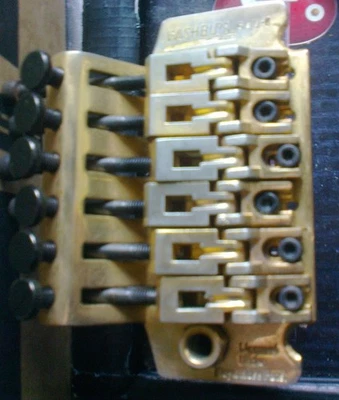 Guitarra Takeuchi Vintage Washburn 600-S Gold Floyd Rose Tremolo Bridge 1993 Foto 1 de 4