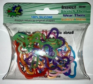 Pulseras elásticas Silly Bandz 12 formas de insectos (paquete de 12) TOTALMENTE NUEVAS - Imagen 1 de 3