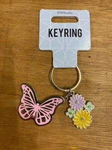 Butterfly & Flower keyring pack of 3 - BRAND NEW with tag - Foto 1 di 1